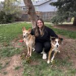 Dr. Campbell outside with her two dogs